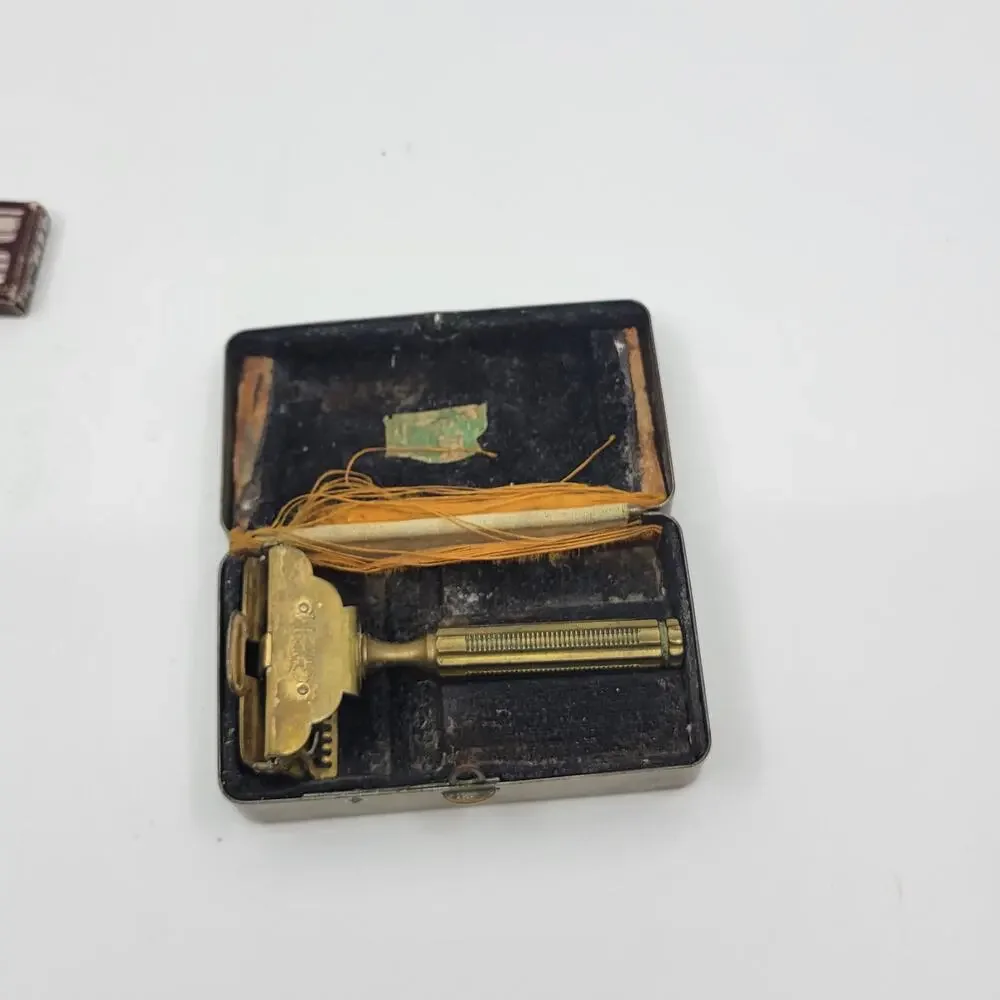 Vintage GEM Junior Single Edge Razor with original brass case and accessories